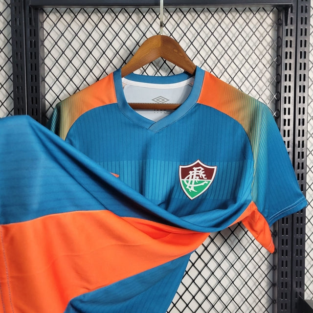 Camisa Fluminense Pré-Jogo 23/24 Torcedor Umbro Masculina - Azul e Laranja