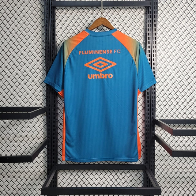 Camisa Fluminense Pré-Jogo 23/24 Torcedor Umbro Masculina - Azul e Laranja